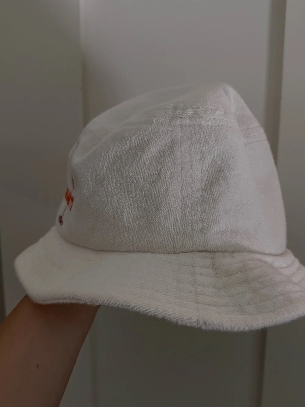 The Enchanté Cafe bucket hat in white terry cloth